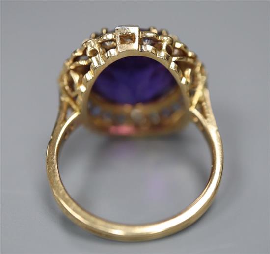 An 18ct yellow gold, amethyst, sapphire and diamond dress ring, with claw-set basket mount, size N, gross 7.5g